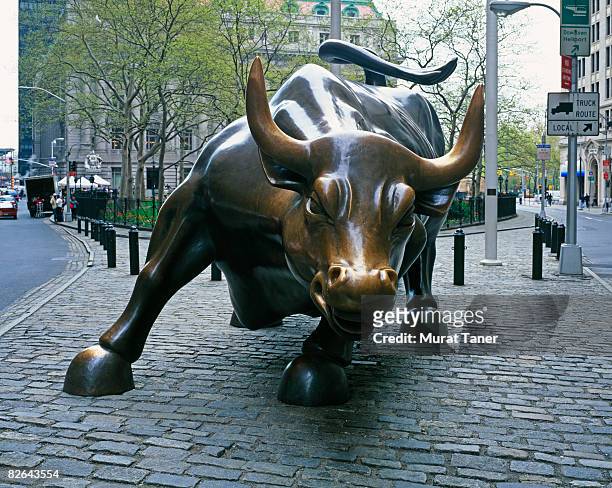 bull - charging bull statue stock pictures, royalty-free photos & images