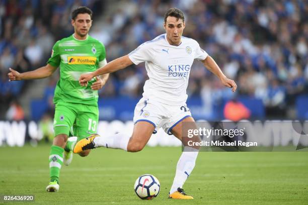 Matty James of Leicester in action with Lars Stindl of Borussia Moenchengladbach during the preseason friendly match between Leicester City and...