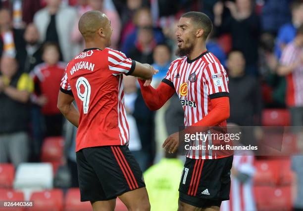 Lewis Grabban, of Sunderland celebrates with James Vaughan of Sunderland after scoring a goal from the penalty spot during the Sky Bet Championship...