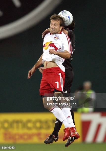 Mike Magee of the New York Red Bulls goes up for a header during an MLS match against D.C. United at RFK Stadium on August 30 2008, in Washington...
