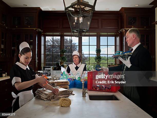 servants recycling household trash. - cleaner man uniform stock-fotos und bilder