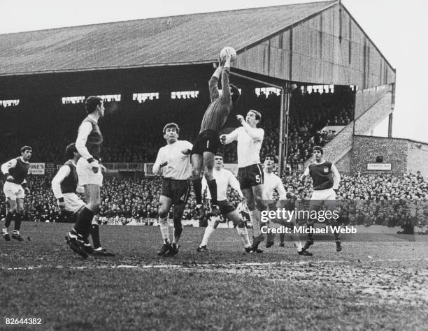 Chelsea goalkeeper Peter Bonetti goes high to collect the ball during an attack by Brighton & Hove Albion FC during an FA Cup 4th round match at...