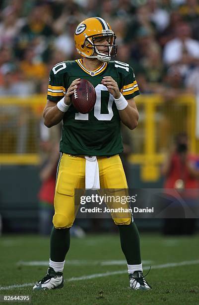 Matt Flynn of the Green Bay Packers looks for a receiver against the Tennessee Titans on August 28, 2008 at Lambeau Field in Green Bay, Wisconsin....