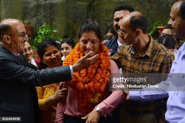 Indian women cricket team member Sushma Verma get emotional while they meet school staff and students during her visit of her old school Government...