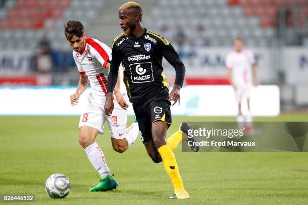 Vincent Marchetti of Nancy and Didier Lamkel Ze of Niort during the French Ligue 2 match between Nancy and Niort at Stade Marcel Picot on August 4,...