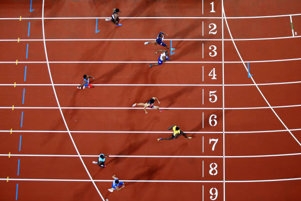 Usain Bolt of Jamaica crosses the finish line during the mens 100m heats during day one of the 16th IAAF World Athletics Championships London 2017 at...
