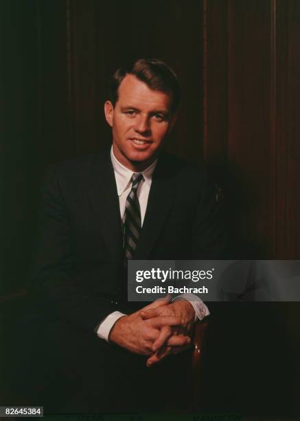 Portrait of the American politician Robert F. Kennedy , with his hands clasped upon his knee, Massachussetts, mid-20th century. He served as the 64th...