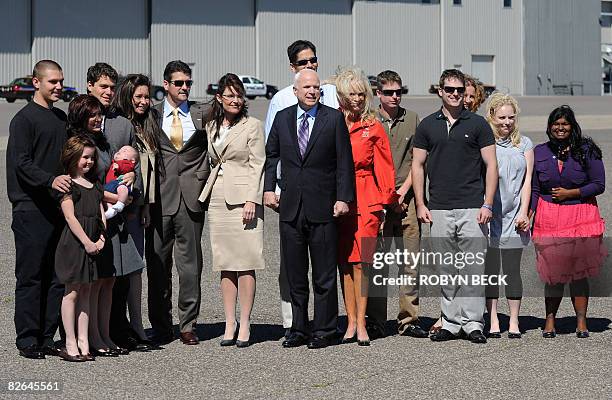 Republican presidential candidate John McCain and his running mate Alaska Governor Sarah Palin poses for a photo with their families as McCain...