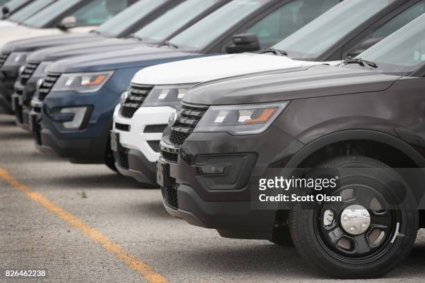 Ford Explorer based Police Interceptors sit in a parking lot of Troy Design and Manufacturing where they are outfitted to police department...