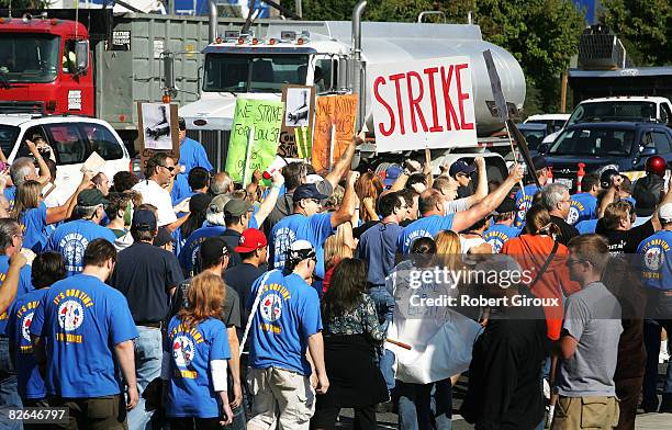 Boeing machinists march to their IAW Union local September 3, 2008 in Everett, Washington. The union members are heading to vote on two proposals,...