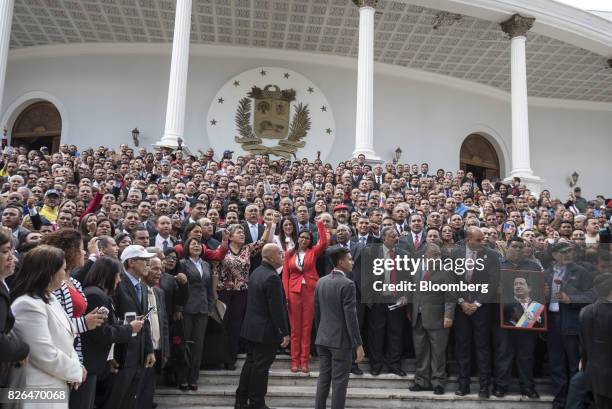 Delcy Rodriguez, president of the Constituent Assembly, center, stands with members of the Assembly in Caracas, Venezuela, on Friday, Aug. 4, 2017....