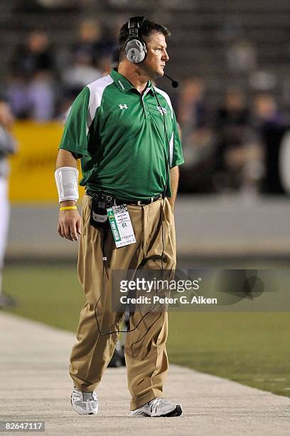 Head coach Todd Dodge of the North Texas Mean Green looks out onto the field during the 4th quarter against the Kansas State Wildcats on August 30,...