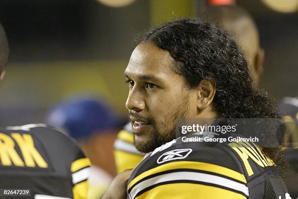 Safety Troy Polamalu of the Pittsburgh Steelers looks on from the sideline during a preseason game against the Carolina Panthers at Heinz Field on...