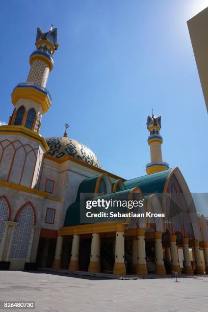 sideview of islamic center mosque in mataram, lombok, indonesia - cupola stock pictures, royalty-free photos & images