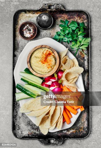 hummus with vegetables and tortilla chips - crudites stock pictures, royalty-free photos & images