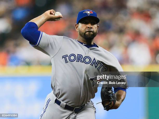 Cesar Valdez of the Toronto Blue Jays pitches in the first inning against the Houston Astros at Minute Maid Park on August 4, 2017 in Houston, Texas.