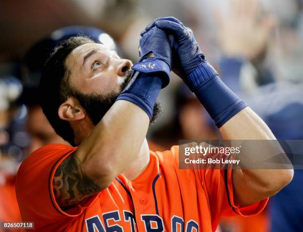 Marwin Gonzalez of the Houston Astros celebrtates in the dugout after hitting a three-run home run in the fourth inning against the Toronto Blue Jays...