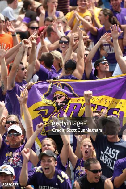 Fans of the East Carolina Pirates celebrate after a touchdown against the Virginia Tech Hokies at Bank of America Stadium on August 30, 2008 in...