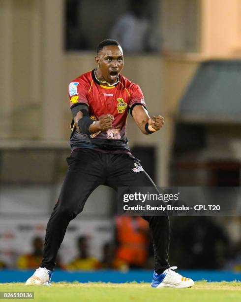 In this handout image provided by CPL T20, Dwayne Bravo of Trinbago Knight Riders celebrates the dismissal of Rahkeem Cornwall of St Lucia Stars...