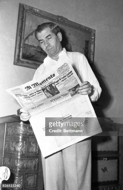 Charles "Lucky" Luciano, shown above reading a Rome newspaper, has been named in a Senate Crime Investigating Committee report, February 28, as the...