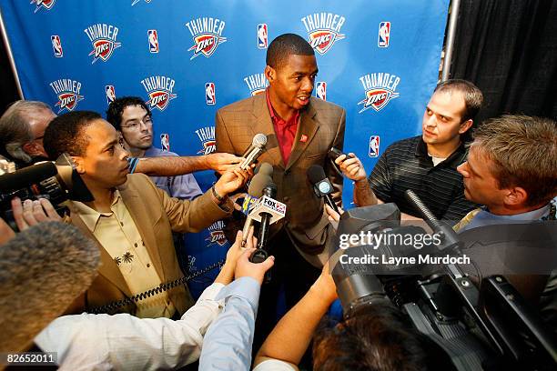 Desmond Mason of the Oklahoma City Thunder speaks to media after the Oklahoma City NBA franchise unveiled its new Thunder logo and colors at a press...