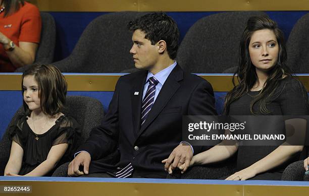 Bristol , daughter of vice presidential nominee Sarah Palin, holds hands with boyfriend Levi Johnston, flanked by Bristol's little sister Piper...