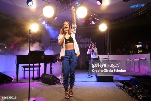 Vanessa Mai performs during the late night shopping at Designer Outlet Soltau on August 4, 2017 in Soltau, Germany.