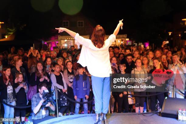 Vanessa Mai performs during the late night shopping at Designer Outlet Soltau on August 4, 2017 in Soltau, Germany.
