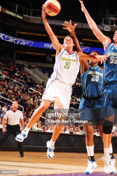 Kelly Miller of the Phoenix Mercury shoots against Kristen Rasmussen of the Minnesota Lynx at U.S. Airways Center September 3, 2008 in Phoenix,...