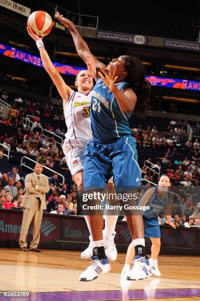 Diana Taurasi of the Phoenix Mercury shoots against Nicky Anosike of the Minnesota Lynx at U.S. Airways Center September 3, 2008 in Phoenix, Arizona....