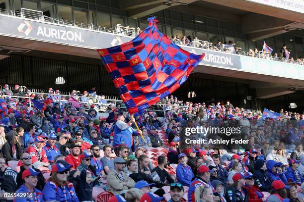 Knights fans support their team during the round 22 NRL match between the Newcastle Knights and the New Zealand Warriors at McDonald Jones Stadium on...