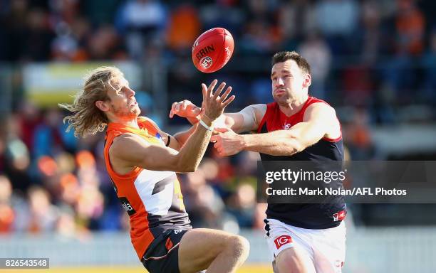 Nic Haynes of the Giants contests a mark during the round 20 AFL match between the Greater Western Sydney Giants and the Melbourne Demons at UNSW...