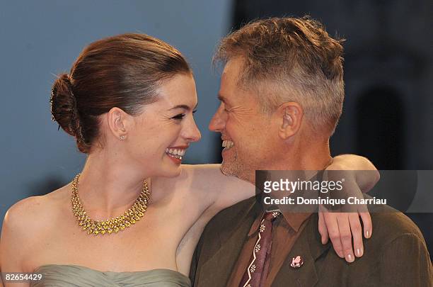 Actress Anne Hathaway and director Jonathan Demme attend the 'Rachel Getting Married' film premiere at the Sala Grande during the 65th Venice Film...