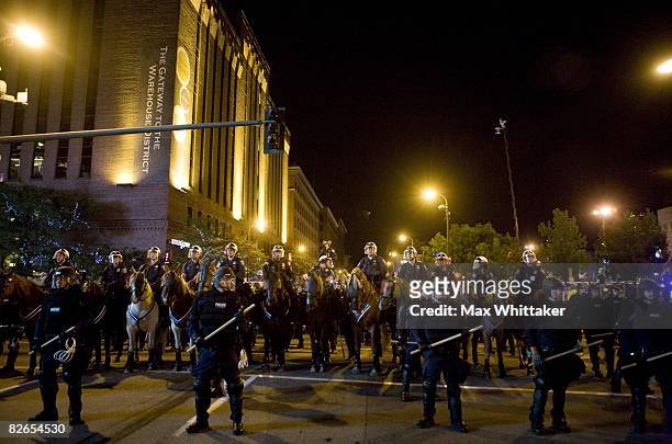 Police block off a street as Rage Against the Machine fans protest outside the Target Center on September 3, 2008 in Minneapolis, Minnesota. The...