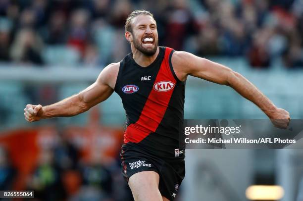 Cale Hooker of the Bombers celebrates during the 2017 AFL round 20 match between the Essendon Bombers and the Carlton Blues at the Melbourne Cricket...