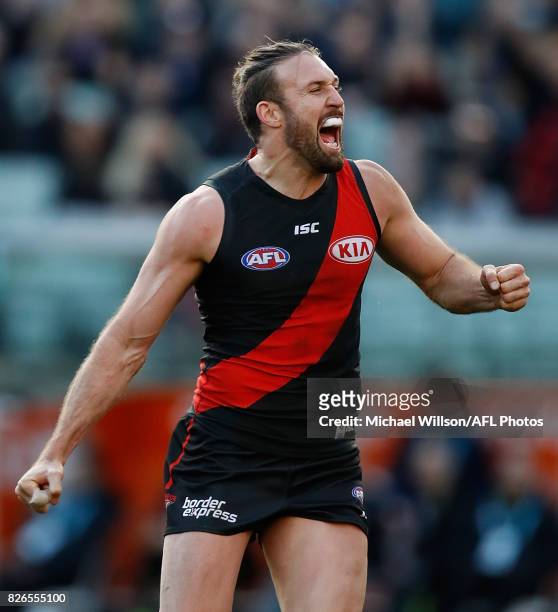 Cale Hooker of the Bombers celebrates during the 2017 AFL round 20 match between the Essendon Bombers and the Carlton Blues at the Melbourne Cricket...