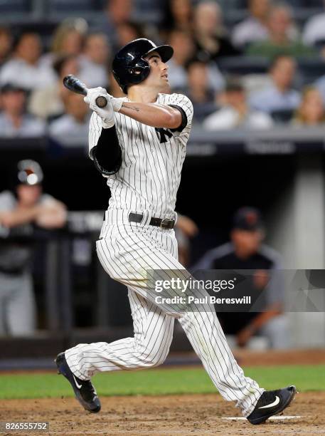 Tyler Wade of the New York Yankees bats in an MLB baseball game against the Detroit Tigers on July 31, 2017 at Yankee Stadium in the Bronx borough of...