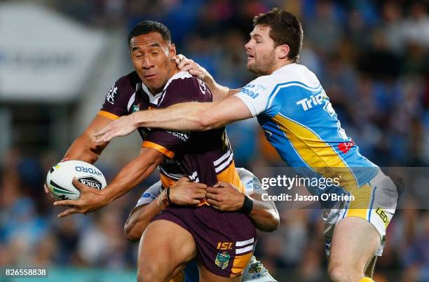 Tautau Moga of the broncos in action during the round 22 NRL match between the Gold Coast Titans and the Brisbane Broncos at Cbus Super Stadium on...
