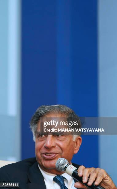 Chairman of India's Tata Motors Ratan Tata addresses a panel-discussion during The Society of Indian Automobile Manufacturers Annual General Meeting...