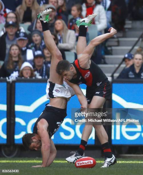 Levi Casboult of the Blues and Patrick Ambrose of the Bombers compete for the ball during the 2017 AFL round 20 match between the Essendon Bombers...
