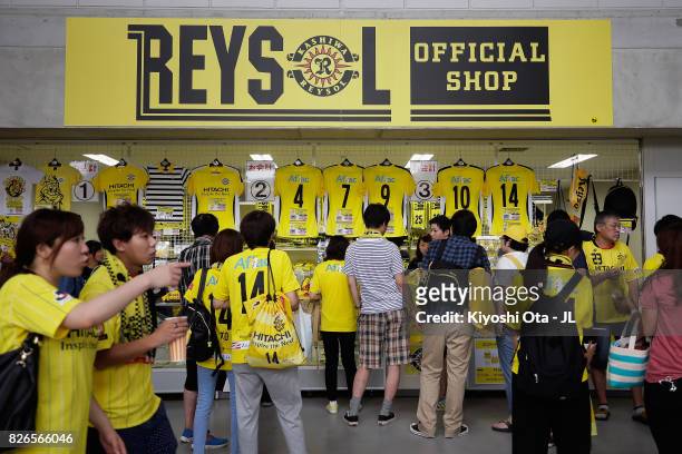Kashiwa Reysol supporters check the official marchandise shop prior to the J.League J1 match between Kashiwa Reysol and Vissel Kobe at Hitachi...