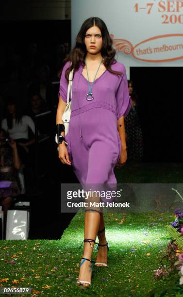 Model showcases designs by Ginger & Smart as part of the KaleidEscape catwalk show on the third day of Melbourne Spring Fashion Week 2008, at...