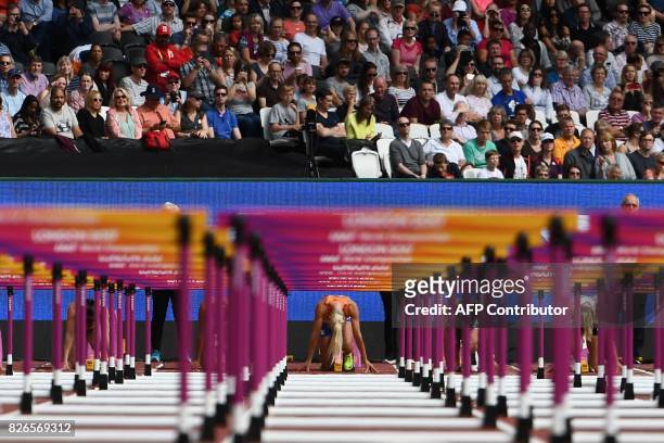 Netherlands' Nadine Broersen competes in the 100m hurdles of the women's heptathlon athletics event at the 2017 IAAF World Championships at the...