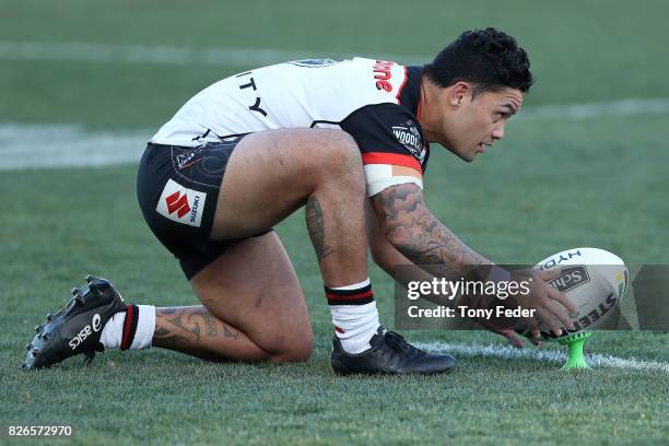 Issac Luke of the Warriors lines up a conversion kick during the round 22 NRL match between the Newcastle Knights and the New Zealand Warriors at...