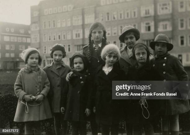 From left to right, Sanne Ledermann, Hanneli Goslar, unknown, unknown, Anne Frank , Margot Frank , unknown, unknown, Merwedeplein, Amsterdam, circa...