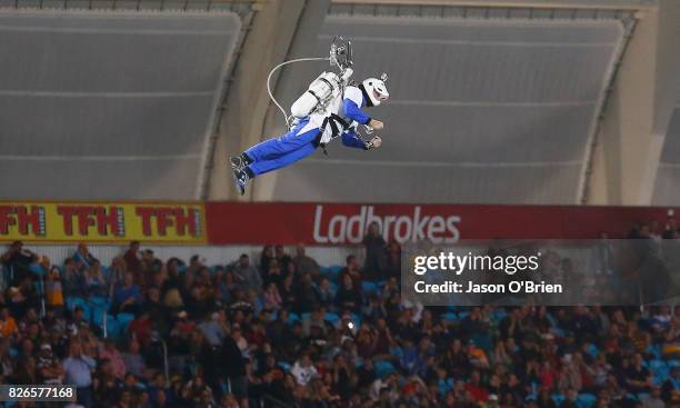 Rocketman entertains the crowd at half time during the round 22 NRL match between the Gold Coast Titans and the Brisbane Broncos at Cbus Super...