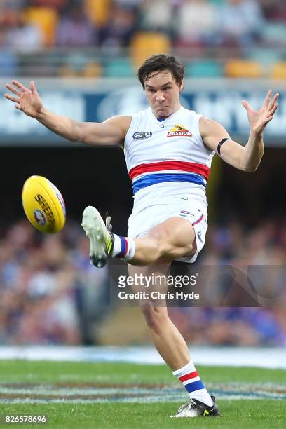 Lukas Webb of the Bulldogs kicks during the round 20 AFL match between the Brisbane Lions and the Western Bulldogs at The Gabba on August 5, 2017 in...