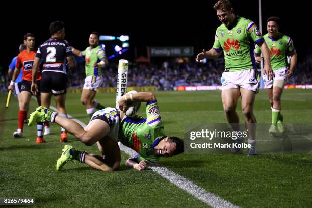 Jordan Rapana of the Raiders celebrates scoring a try during the round 22 NRL match between the Cronulla Sharks and the Canberra Raiders at Southern...