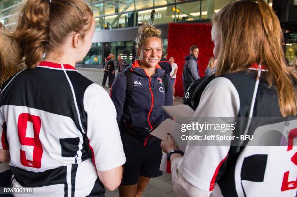 Kay Wilson meets with fans and well wishers as the England Womens' Rugby team depart for the Rugby World Cup at Heathrow Airport on August 5, 2017 in...