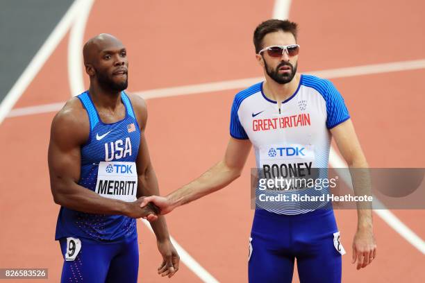 Martyn Rooney of Great Britain shakes hands with Shawn Merritt of the United States in the Men's 400 metres during day two of the 16th IAAF World...